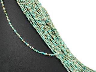 Facettierte, durchbohrte, blau-grüne Türkiskugeln