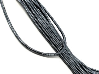 Durchbohrte, graue Hämatitscheiben