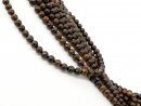 Pierced brown opal beads
