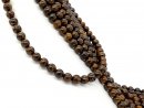 Pierced brown opal beads