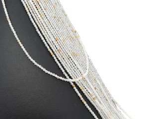 Faceted, pierced topaz spheres