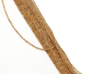 brown pierced garnet balls