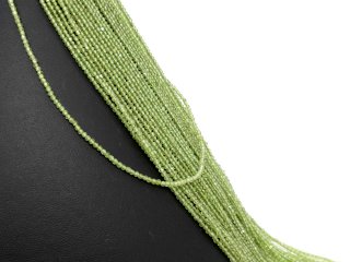 Pierced, faceted, green peridot beads