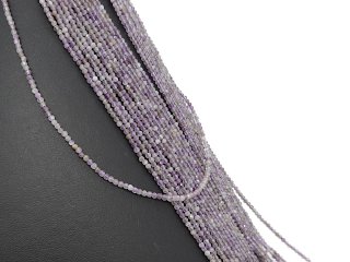 Faceted, pierced amethyst beads