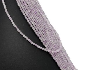 purple-coloured, pierced kunzite beads with facets