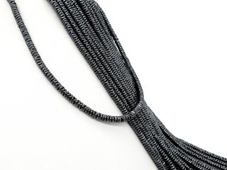 Durchbohrte, dunkelgraue Hämatit-Scheiben