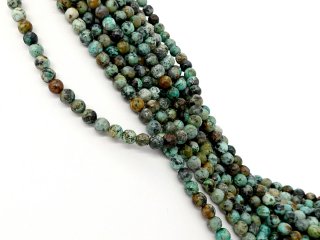 Facettierte, durchbohrte, blau-grüne Türkiskugeln