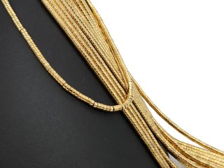 Cylindres dhématite dorés percés et scintillants