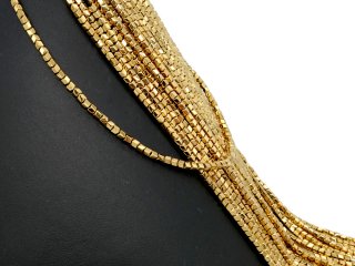 Durchbohrte, funkelnde, goldene Hämatit-Zylinder