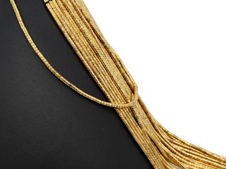 Pierced, sparkling, golden haematite cylinders