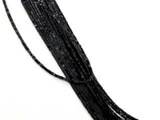 Durchbohrte, schwarze Hämatitscheiben