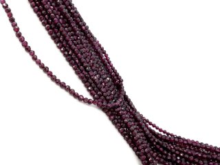Faceted, pierced, dark red garnet beads