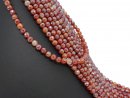 Silver shimmering, faceted, red, pierced agate beads