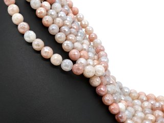 Durchbohrte, facettierte Aventurinkugeln in drei Farben