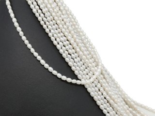 Oval white cultured pearls