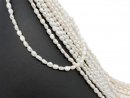 Petites perles de culture baroques percées blanches