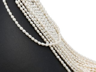 Petites perles de culture baroques percées blanches