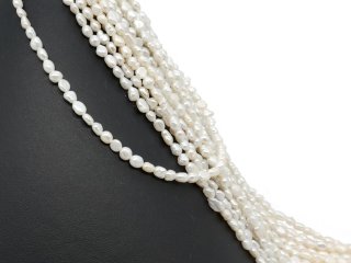 Petites perles de culture baroques percées blanches