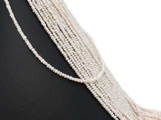 Pierced, baroque, small cultured pearls in white