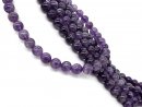 Purple, pierced amethyst beads