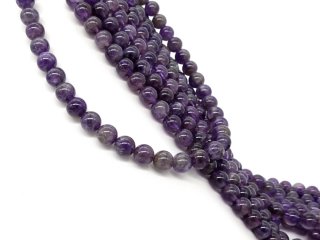Purple, pierced amethyst beads