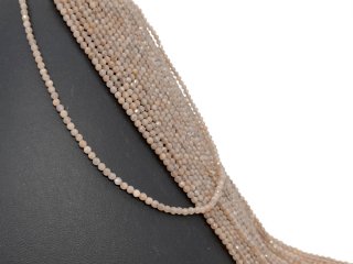 Facettierte, durchbohrte Sonnensteine