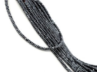 Durchbohrte, graue Hämatitscheiben