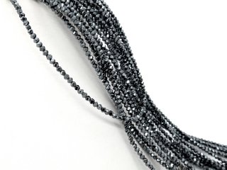 Durchbohrte, graue Hämatitscheiben