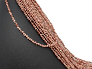 Small, faceted, pierced rhodochrosite beads