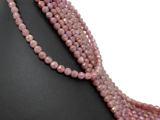 Galvanisierte, durchbohrte Quarzkugeln mit Facetten in Malve