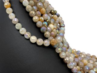 Durchbohrte, bunt schimmernde, facettierte Rutilquarz-Kugeln