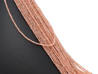 Facettierte, durchbohrte und orangefarbene Sonnensteine