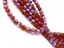 Colourful, shimmering, faceted, pierced red agate beads