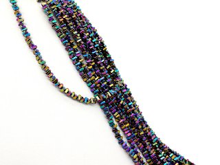 Durchbohrte, bunte Hämatit-Scheiben