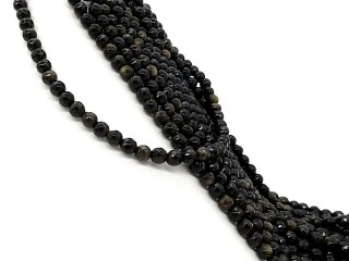 Facettierte, kleine, durchbohrte Obsidianperlen in Schwarz