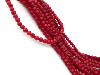 Rote, durchbohrte Quarzitkugeln