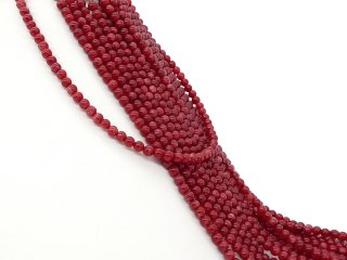 Rote, durchbohrte Quarzitkugeln