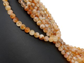 Durchbohrte Citrinkugeln in gelb