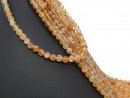 Pierced citrine beads in yellow