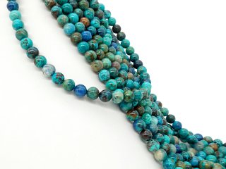 Durchbohrte Chrysokollkugeln in Blau und Grün