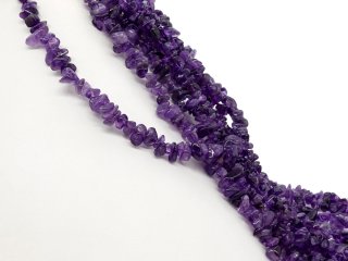 Pierced, pebble-shaped amethysts