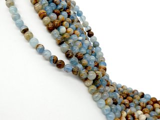 Blaue und braune, durchbohrte Calcit-Kugeln