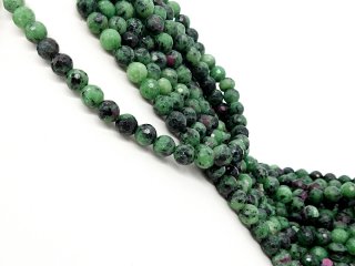 Facettierte Anyolitkugeln in Schwarz, Magenta und Grün