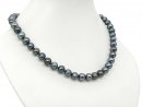 dark gray necklace with cultured pearls and a ball clasp