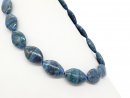 Ovale, durchbohrte Lapislazuli-Scheiben
