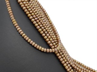 Light brown, pierced cultured pearls