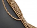 Light brown, pierced cultured pearls