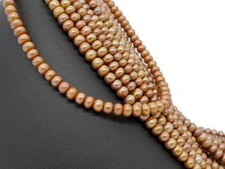 Light brown, pierced cultured pearls
