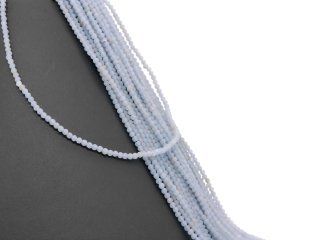 Faceted, pierced, small angelite beads in blue