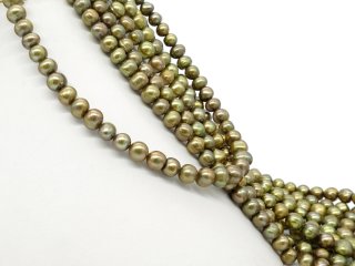 Green, cultured pearls